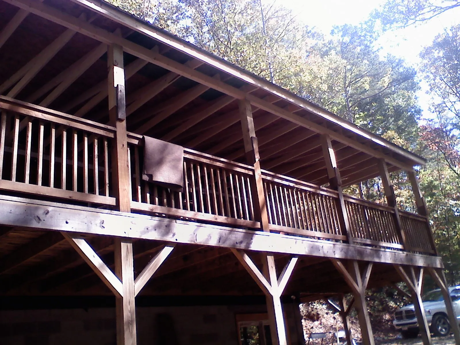 Timber framing under a new elevated porch and deck — Roof Leak Repair in Lithonia by Roofing Brothers